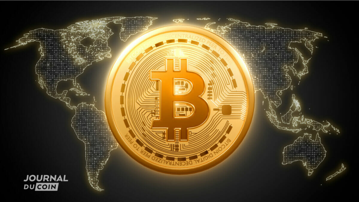 pièce jeton bitcoin sur fond carte du monde