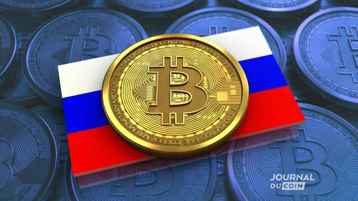 Un Bitcoin posé sur le drapeau russe